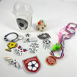 brand New Pre-Owned Soccer Goodies Set in Cup - Stickers, Whistle, Ducky, Medal.